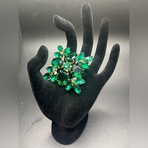 vintage emerald green rhinestone brooch large gold tone statement pin. 1960s